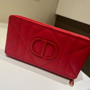 Christian Dior red leather clutch